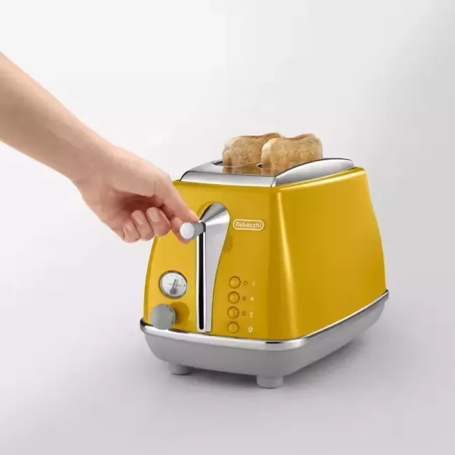 GRILLE PAIN Icona Capitals jaune De'Longhi